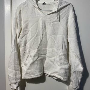 White knitted sweater from Greece